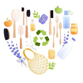 Heart-shaped eco goods for a sustainable skincare and zero-waste lifestyle Heart-shaped flat lay of recyclable eco-friendly items on a white background